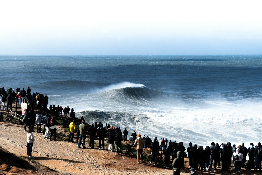 how Big Waves in Nazaré are on the photos.