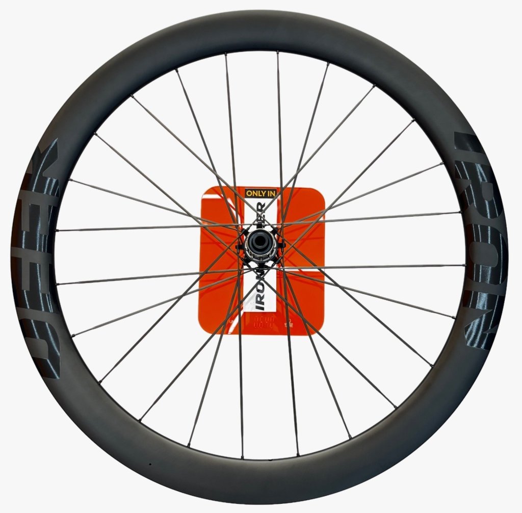 IronDeer R50 SL carbon road front wheel on a workshop scale.